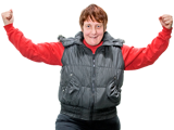 A woman with her arms in the air looking confident. 